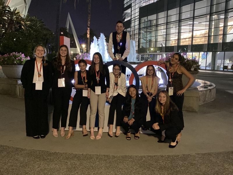 Following the 2023 NLC Opening Session, Mariner BPA students (l-r) Caleb Marcus, top, and Ariel King, Elena Booth, Emily Wells, Kate Hill, Natalie Longo, Kate Dowd, Hannah Wells, Blair Chubb and Macy Davis gather before competitions begin.